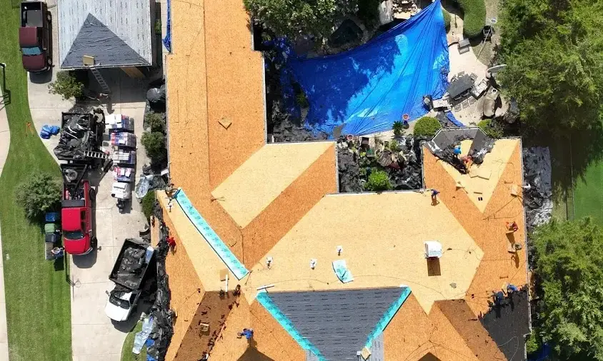 Professional Storm Damage Roof Repair being performed in Forest Park